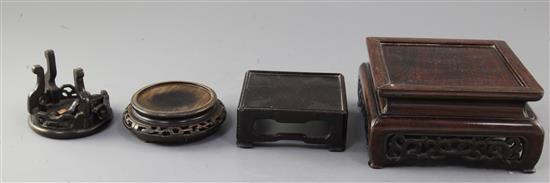 A collection of nine wood Chinese and Japanese hardwood stands, 19th/20th century, the largest 21cm